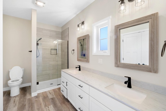 13 Starboard St, Ottawa, IL 61350 - bathroom with hardwood / wood-style flooring, vanity, toilet, and a shower with door