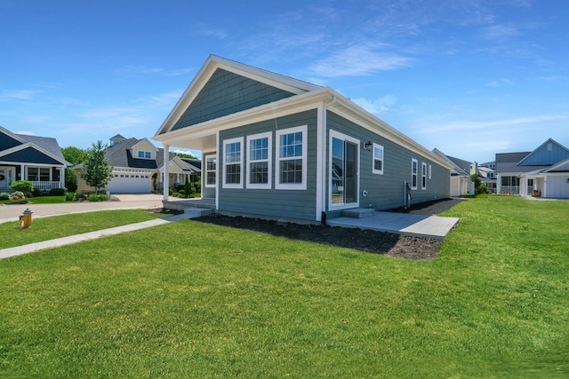 13 Starboard St, Ottawa, IL 61350 - view of side of home with a lawn