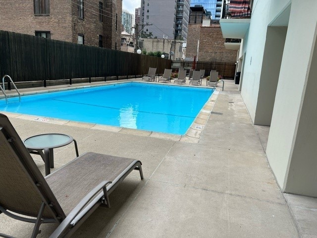 view of pool with a patio area