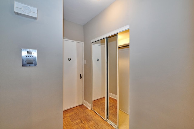 hall with light parquet flooring