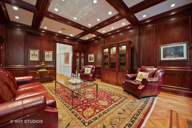 cinema room with ornamental molding, beamed ceiling, coffered ceiling, and a decorative wall