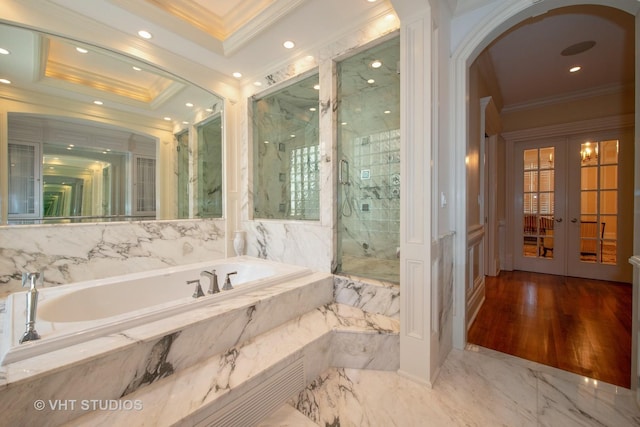 full bath featuring a marble finish shower, marble finish floor, crown molding, french doors, and a bath