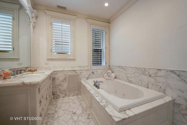 full bath with marble finish floor, visible vents, crown molding, and a wainscoted wall