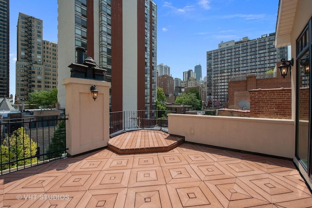 balcony featuring a view of city