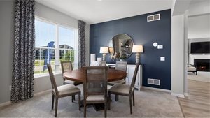 1376 Keller St, Elburn, IL 60119 - carpeted dining room with baseboards and healthy amount of natural light
