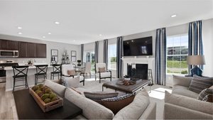 1376 Keller St, Elburn, IL 60119 - living area featuring a fireplace, recessed lighting, and light wood-type flooring