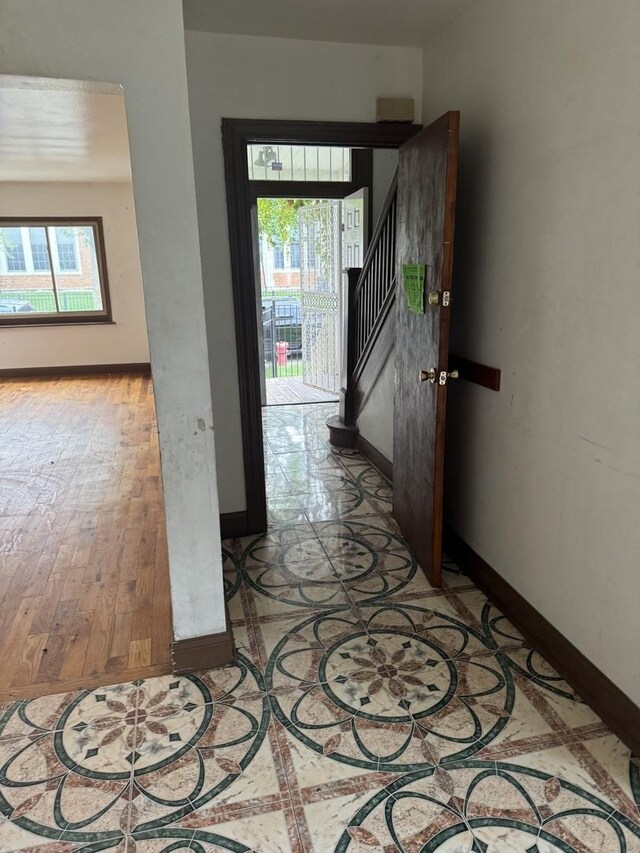 hallway with light wood-type flooring