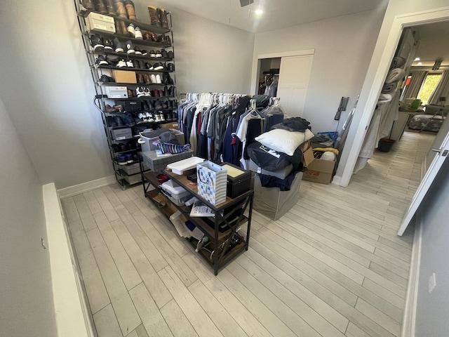 spacious closet with wood finished floors