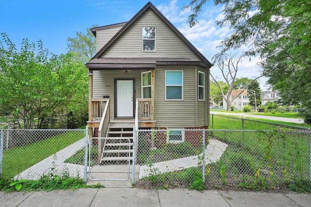 bungalow-style house with a front yard