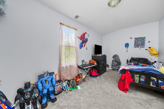 carpeted bedroom featuring vaulted ceiling