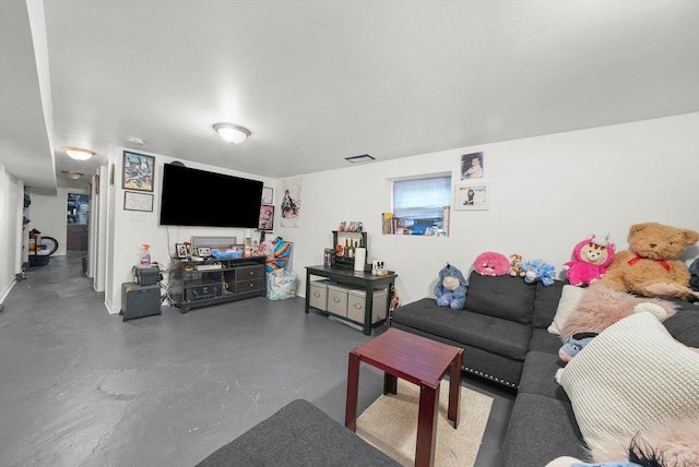 living room featuring concrete floors