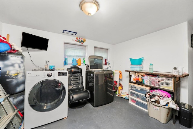 washroom featuring washer / clothes dryer