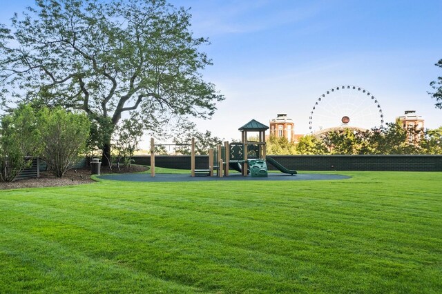 view of play area with a yard