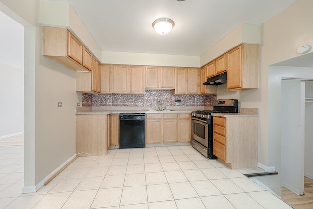 kitchen with light brown cabinets, backsplash, stainless steel range with gas cooktop, dishwasher, and sink