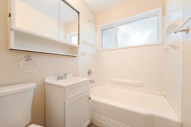 full bathroom with shower / bathing tub combination, vanity, and toilet