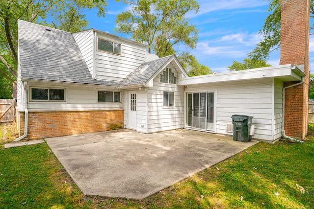 rear view of house featuring a patio area