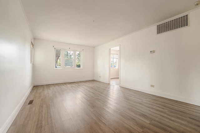 empty room with wood-type flooring