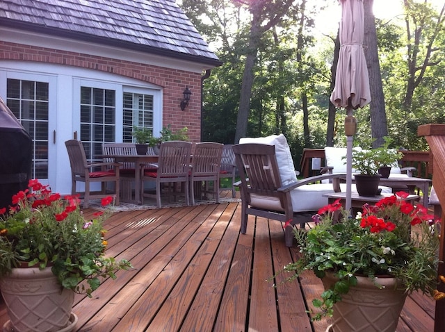 wooden terrace featuring french doors