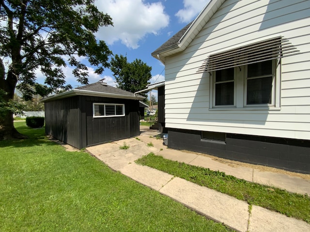 view of home's exterior featuring a yard