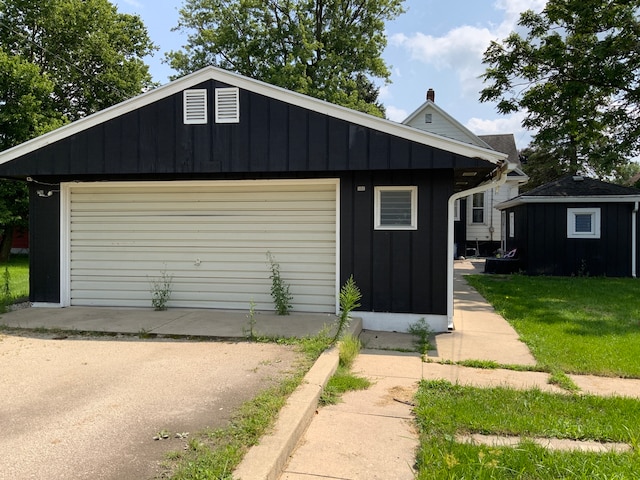 garage with a yard