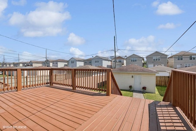 wooden deck with an outdoor structure