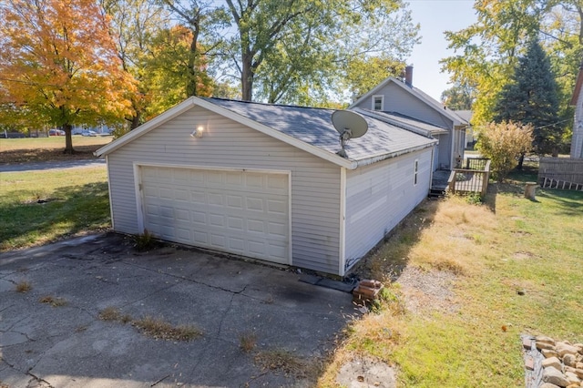 garage with a lawn