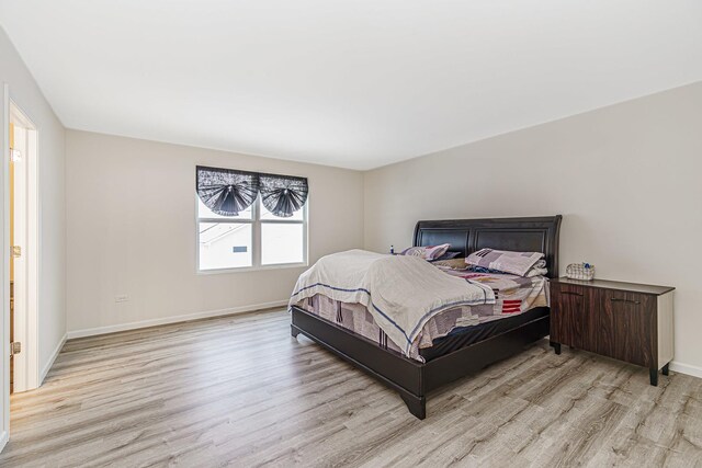 bedroom featuring light hardwood / wood-style floors