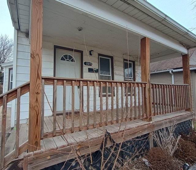 doorway to property with a porch