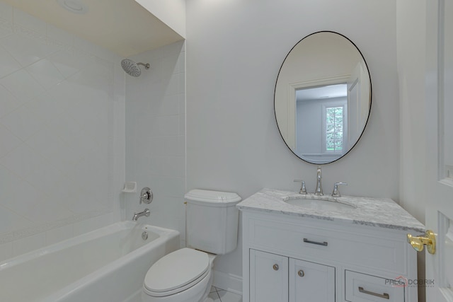 full bathroom featuring vanity, toilet, and tiled shower / bath