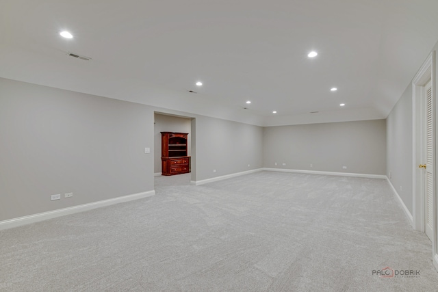 basement with light carpet