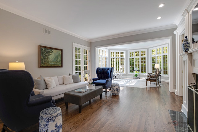 living room featuring crown molding and wood-type flooring