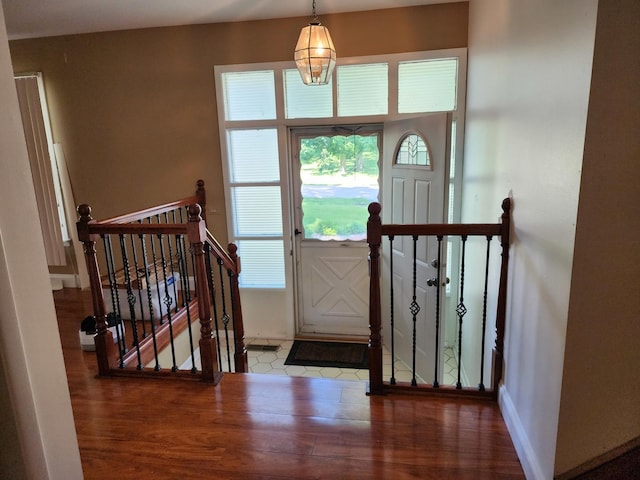 foyer entrance with wood-type flooring