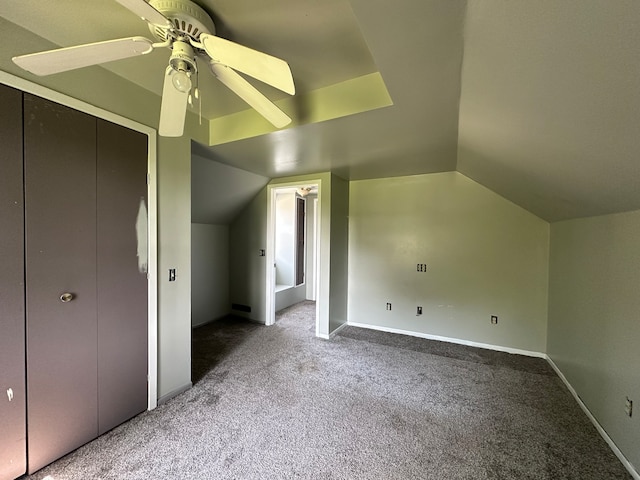 additional living space featuring ceiling fan, carpet flooring, and lofted ceiling