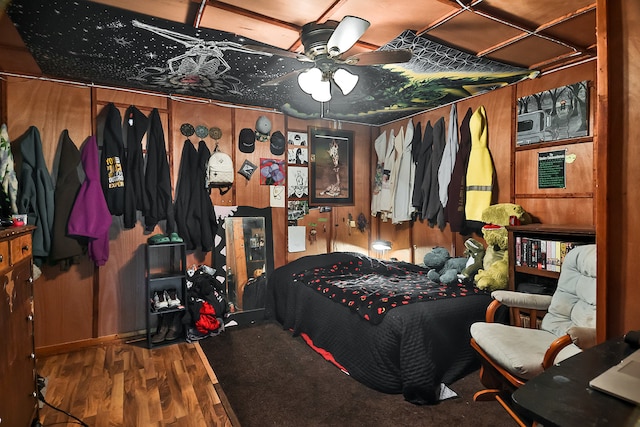 bedroom with dark wood-type flooring and ceiling fan