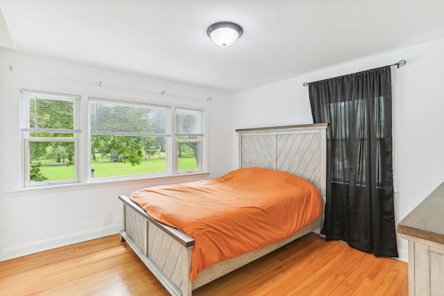 bedroom featuring light wood-type flooring