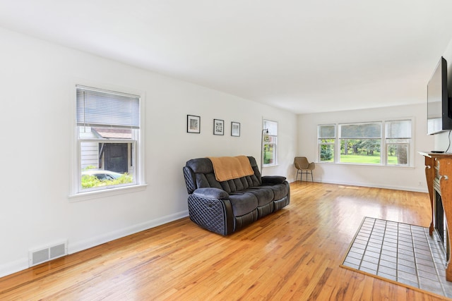 sitting room with light wood-type flooring