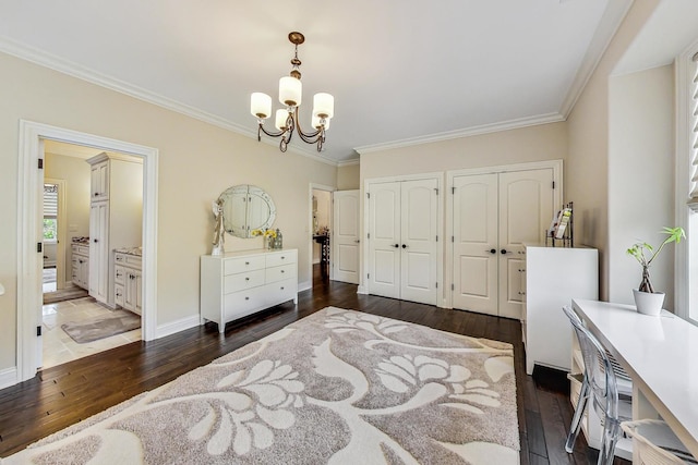 1 Willowcrest Dr, Oak Brook, IL 60523 - bedroom featuring crown molding, hardwood / wood-style flooring, two closets, a notable chandelier, and ensuite bath