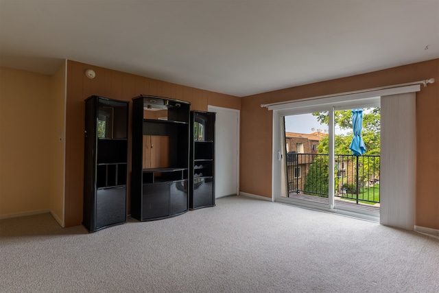 unfurnished room with carpet floors