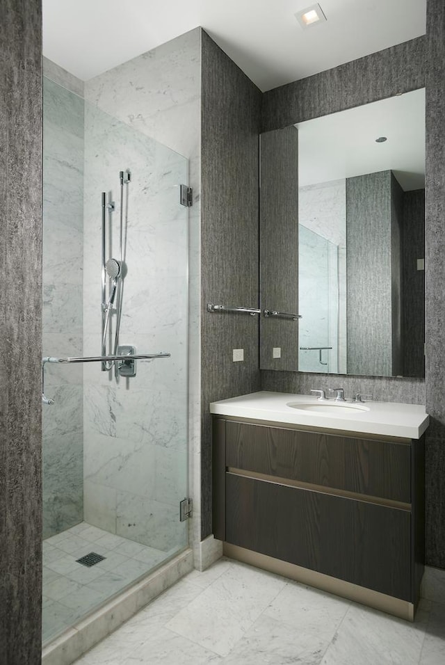 bathroom with vanity and an enclosed shower