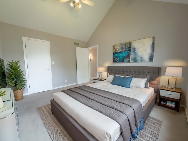 bedroom with carpet, ceiling fan, and high vaulted ceiling