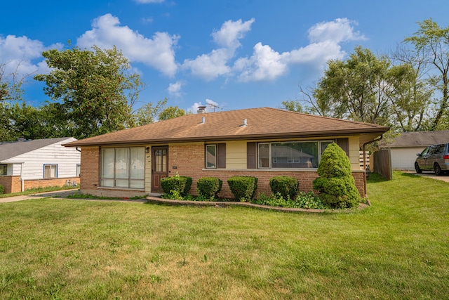 ranch-style house with a front lawn