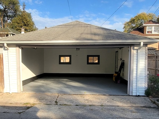 garage featuring a carport