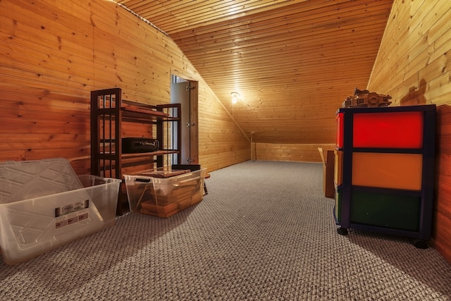 bonus room with carpet, vaulted ceiling, wooden walls, and wood ceiling