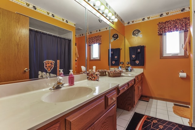 bathroom with vanity and tile patterned floors