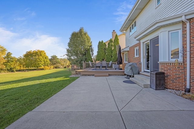 view of patio with a wooden deck