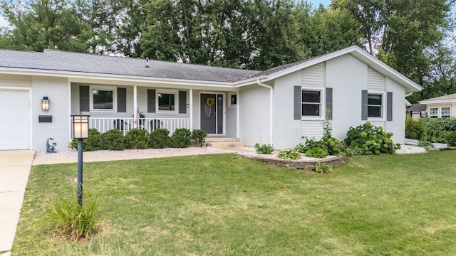 ranch-style home featuring a porch, a garage, and a front lawn