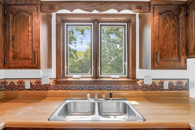 kitchen featuring sink and plenty of natural light