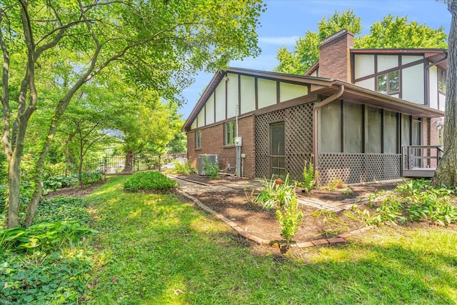 view of property exterior featuring a yard