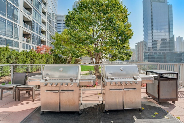 view of patio featuring a grill