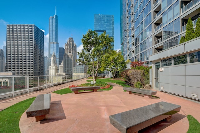 view of home's community with a patio area